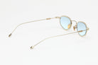 Artus SHON Bronze titanium sunglasses — Light Blue, three-quarter view